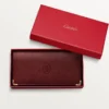 International Wallet with Gussets, Must De Cartier – Burgundy Calfskin, Golden Finish – Cartier