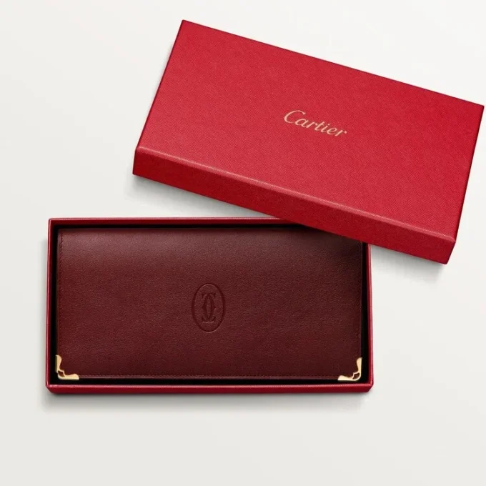 International Wallet with Gussets, Must De Cartier – Burgundy Calfskin, Golden Finish – Cartier