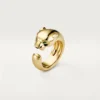 Panthere De Cartier Ring – Yellow Gold, Onyx, Tsavorite Garnet – Cartier