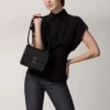 Shoulder Bag, Mini, Double C De Cartier – Black Calfskin, Gold and Black Enamel Finish – Cartier Shoulder Bag, Mini, Double C De Cartier – Black Calfskin, Gold and Black Enamel Finish – Cartier